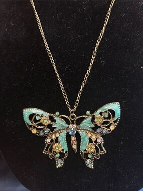 Gold Butterfly Pendant Necklace with Blue Accents